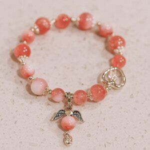 Elegant Pink Beaded Bracelet with Silver Charms